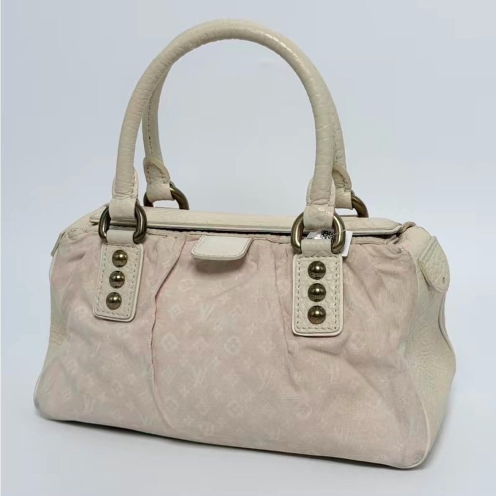 Louis Vuitton Monogram Mini Lin Trapeze PM in light pink